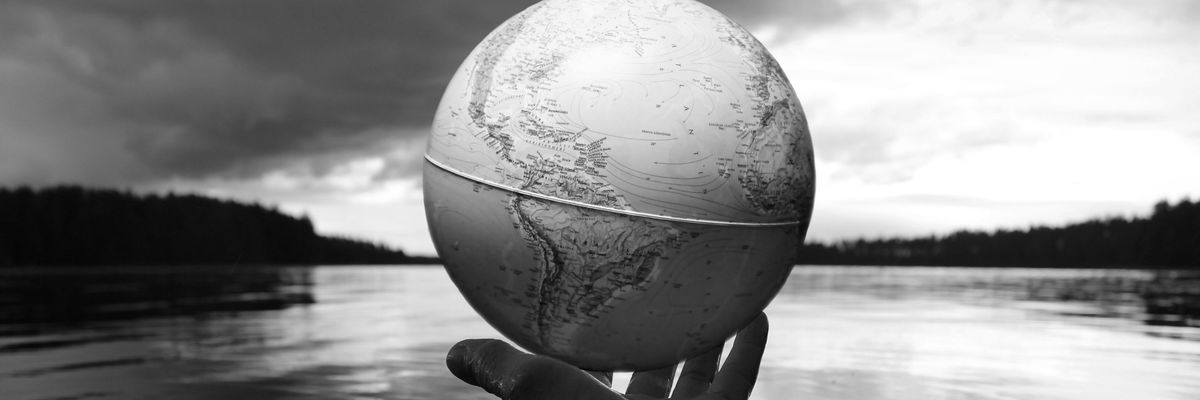 Globe being held in a hand