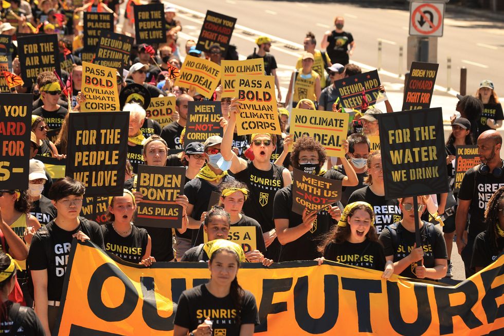 Hundreds of young climate activists march along Pennsylvania Avenue