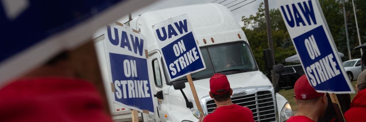 Members of the United Auto Workers (UAW) on strike