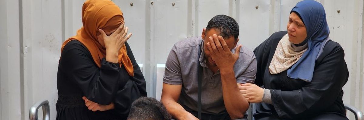 Palestinians mourn dead relatives in Gaza
