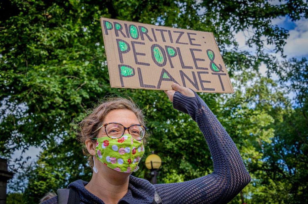 Participant holding a sign at the climate march.