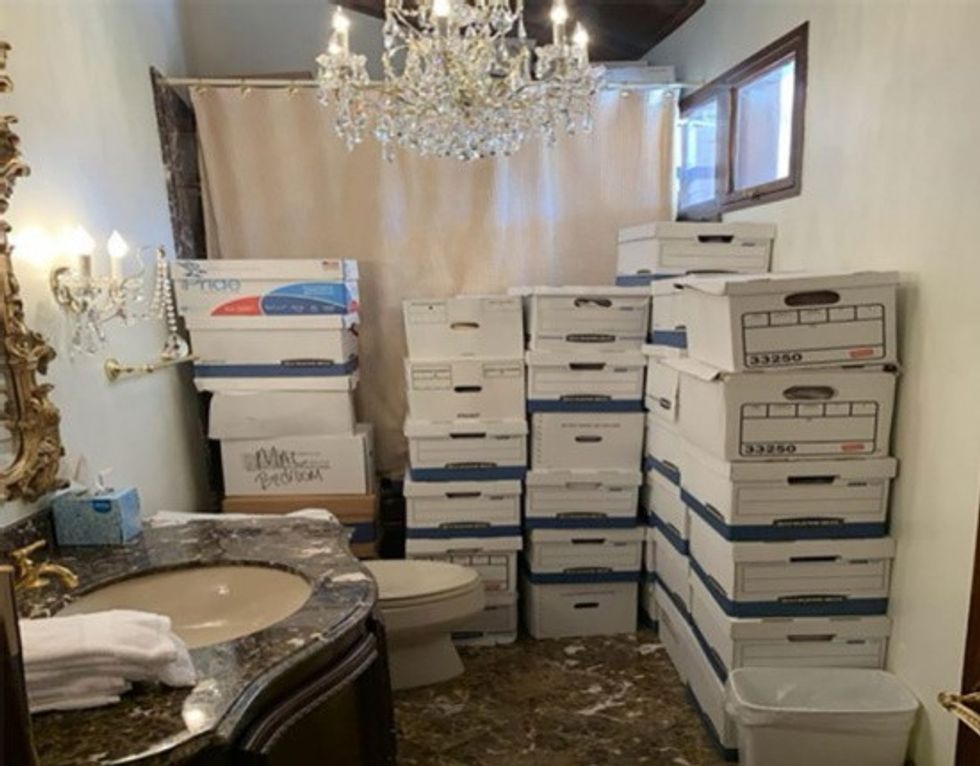 Top secret U.S. government documents stacked in Mar-A-Lago bathroom.