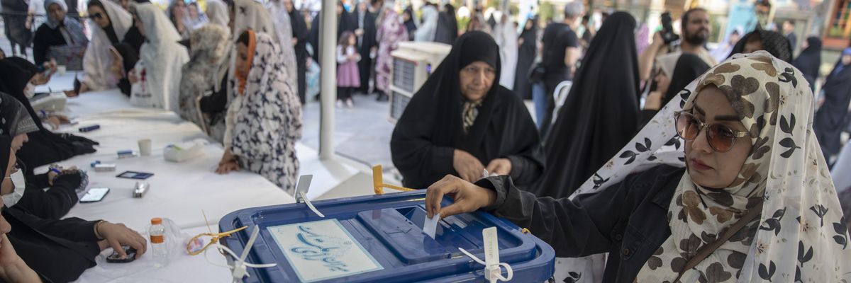 Women vote in Tehran.