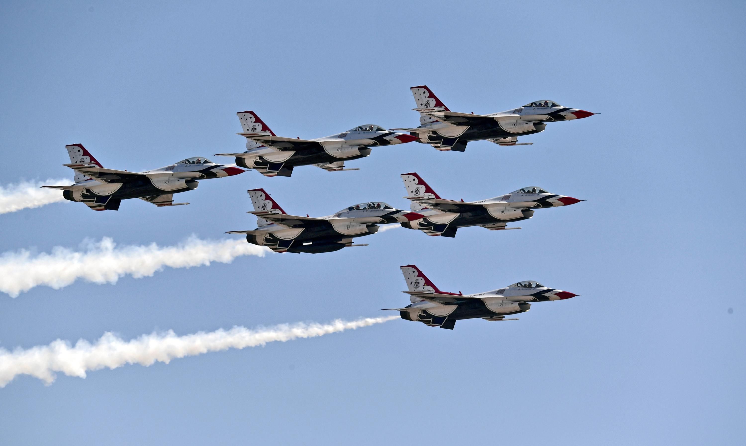 U.S. Air Force fighter jets fly in formation.